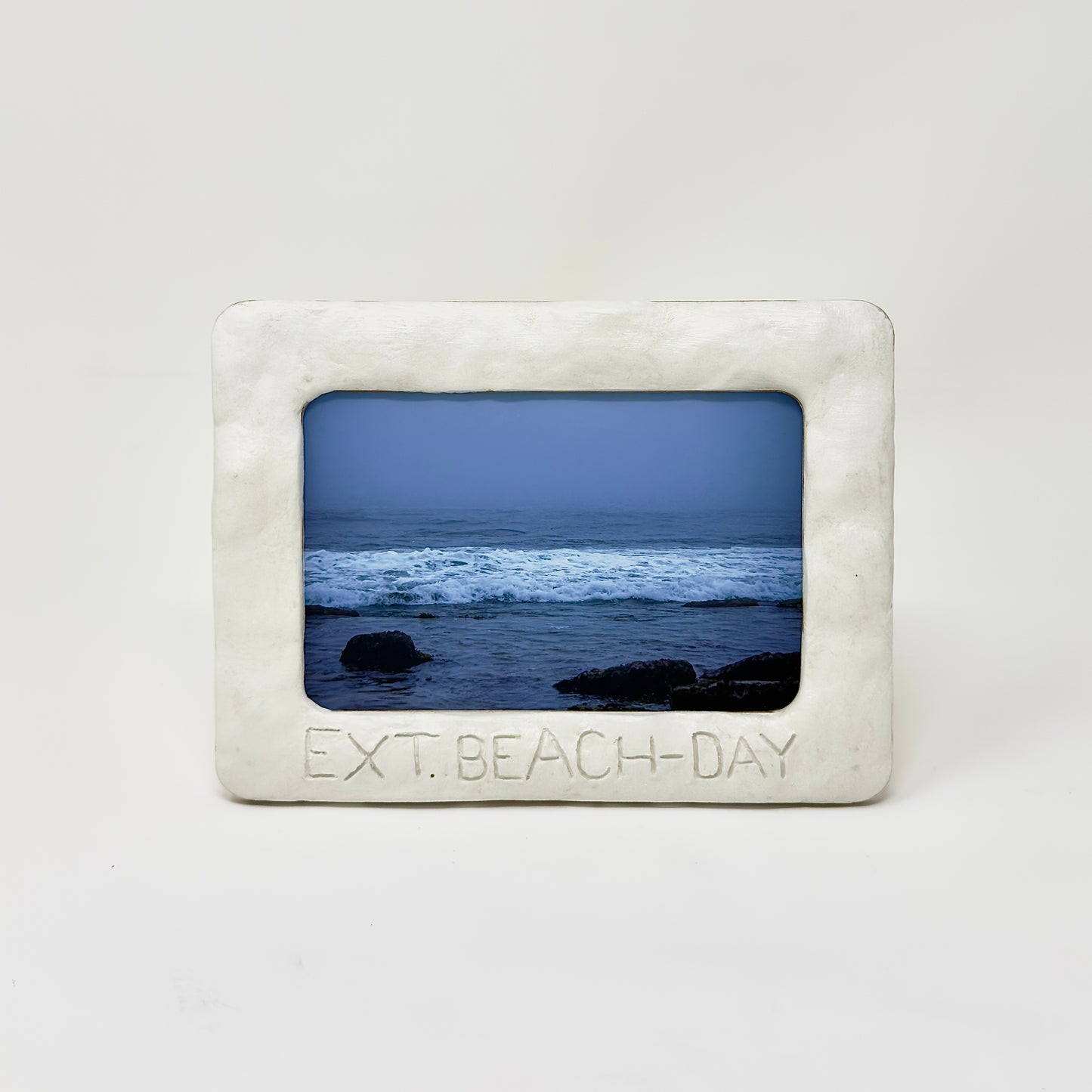 EXT. BEACH - DAY