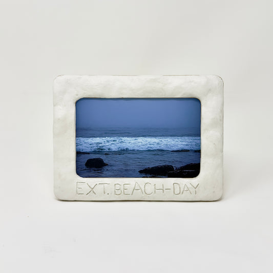 EXT. BEACH - DAY